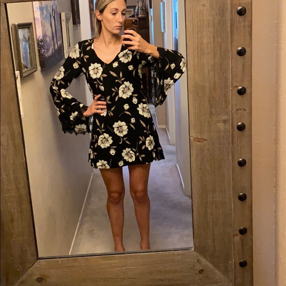 Black floral mini dress with belle sleeves